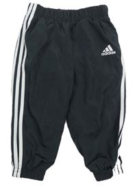 Černo-bílé šusťákové sportovní kalhoty Adidas