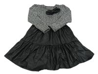 Černo-bílé šaty se vzorem a koženkovu sukní