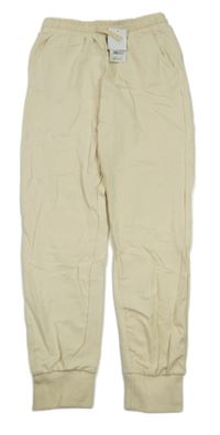 Nové - smetanové tepláky bekkin