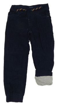 Tmavomodré cuff manšestrové podšité kalhoty impidimpi