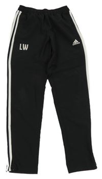 Černé sportovní funkční tepláky s pruhy a logem Adidas