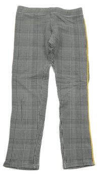 Bílo-černo-žluté kostkované legíny H&M