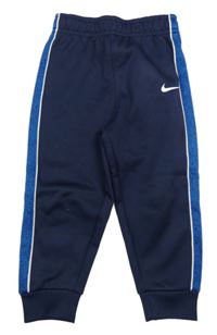 Tmavomodro-modré sportovní kalhoty s logem Nike 