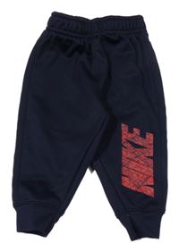 Tmavomodré thermo tepláky s logem Nike