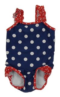 Tmavomodré puntíkaté jednodílné plavky s volánky Miniclub