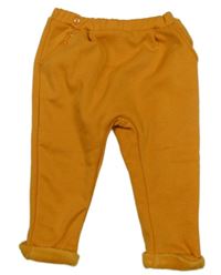 Hořčicové zateplené tepláky Ergee