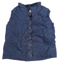 Tmavomodrá šusťáková zateplená vesta 