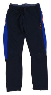 Tmavomodro-safírové sportovní funkční tepláky Kipsta