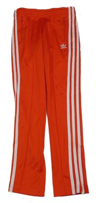 Červeno-bílé sportovní tepláky s pruhy a logem Adidas