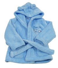 Světlemodrý chlupatý župan s kopačkami a kapucí