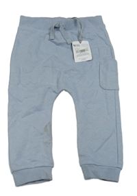 Nové - světlemodré tepláky Tu