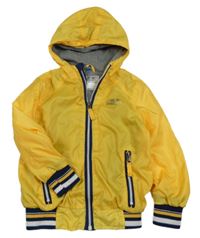 Žlutá šusťáková jarní bunda s nápisem a kapucí Dopodopo