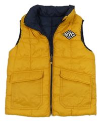 Pomerančová šusťáková oboustranná zateplená vesta s nášivkou C&A