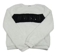 Bílo-černá chlupatá mikina s nápisem z flitrů Y.F.K.