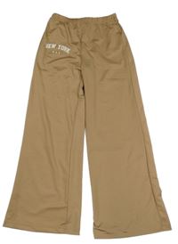Béžové kalhoty s nápisem 