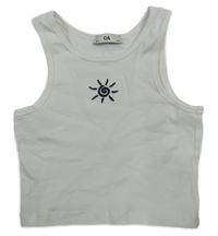 Bílý žebrovaný crop top se sluníčkem C&A