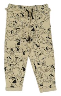 Smetanové tepláky s dalmatiny a volánkem Disney 