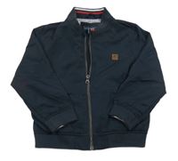 Tmavomodrý šusťákový jarní bomber s nášivkou Next