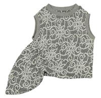 Bílo-černý vzorovaný crop top s cípem River Island