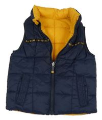 Tmavomodrá šusťáková zateplená oboustranná vesta s nápisem C&A