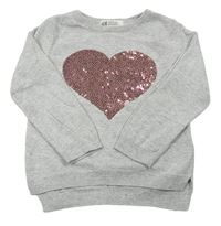 Světlešedý melírovaný svetr se srdcem z flitrů H&M