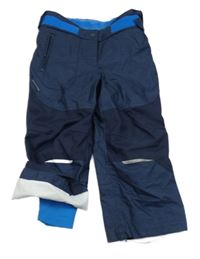 Tmavomodré funkční šusťákové oteplovačky Decathlon