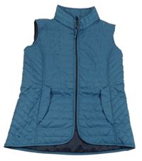 Petrolejová šusťáková jezdecká funkční vesta Fouganza