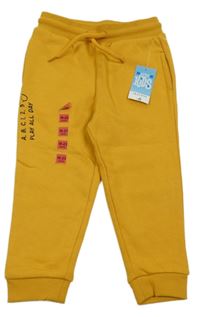 Nové - Hořčicové zateplené tepláky s nápisem Matalan