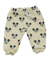 Béžové tepláky s Mickey Mousem C&A