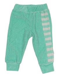 Světletyrkysové sametové tepláky s bílými pruhy zn. Ready