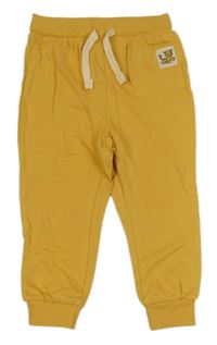 Žluté tepláky s nášivkou Pep&Co