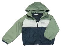 Zeleno-bílo-tmavomodrá šusťáková jarní bunda s potiskem a kapucí H&M