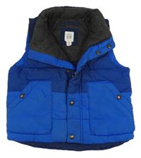 Modro-tmavomodrá šusťáková zateplená vesta GAP 