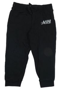 Černé tepláky s nápisem River Island 