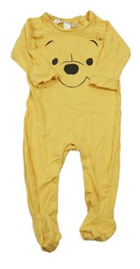 Tmavožlutý overal s Pú H&M