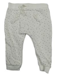 Bílé puntíkaté tepláky George