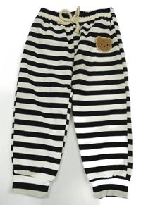 Černo-smetanové pruhované tepláky s medvídkem