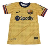 Tmavožluto/tmavomodrý vzorovaný funkční fotbalový dres FCB a číslem Nike