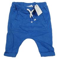 Nové - modré melírované turecké tepláky Next