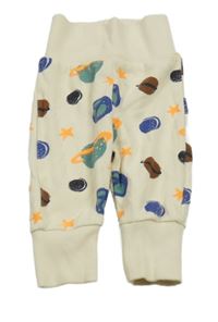 Krémové žebrované tepláky s planetami Topomini