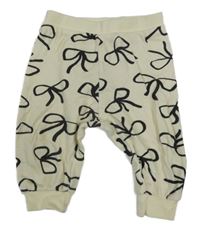 Smetanové tepláky s mašličkami 