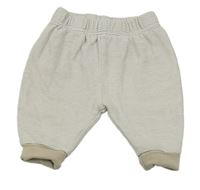 Bílo-hnědé pruhované podšité tepláky