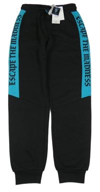 Nové - černo-modré tepláky s nápisem