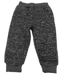 Černo-šedo-bílé melírované pletené tepláky s číslem DANY KIDS