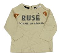 Béžové triko s nápisem Orchestra