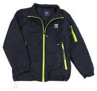 Tmavomodrá šusťáková zateplená bunda s neonovými prvky 