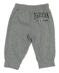 Šedé melírované lehké tepláky s nápisem 