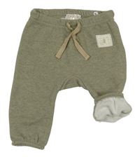 Khaki melírované tepláky s nášivkou 