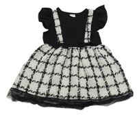 Černo-bílé žebrované šaty s kostkovanou sukní 