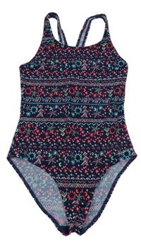 Tmavomodré vzorované jednodílné plavky s měsíci a sluníčky a hvězdičkami